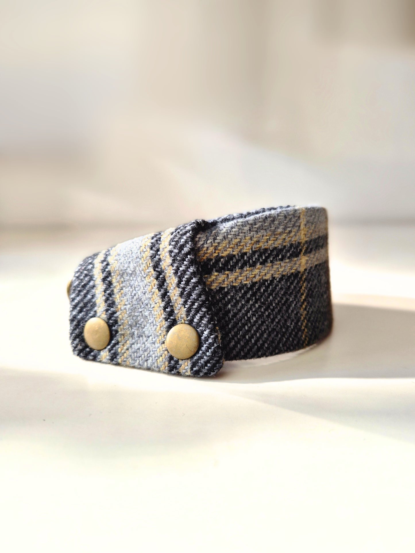 Black and gold collar cover