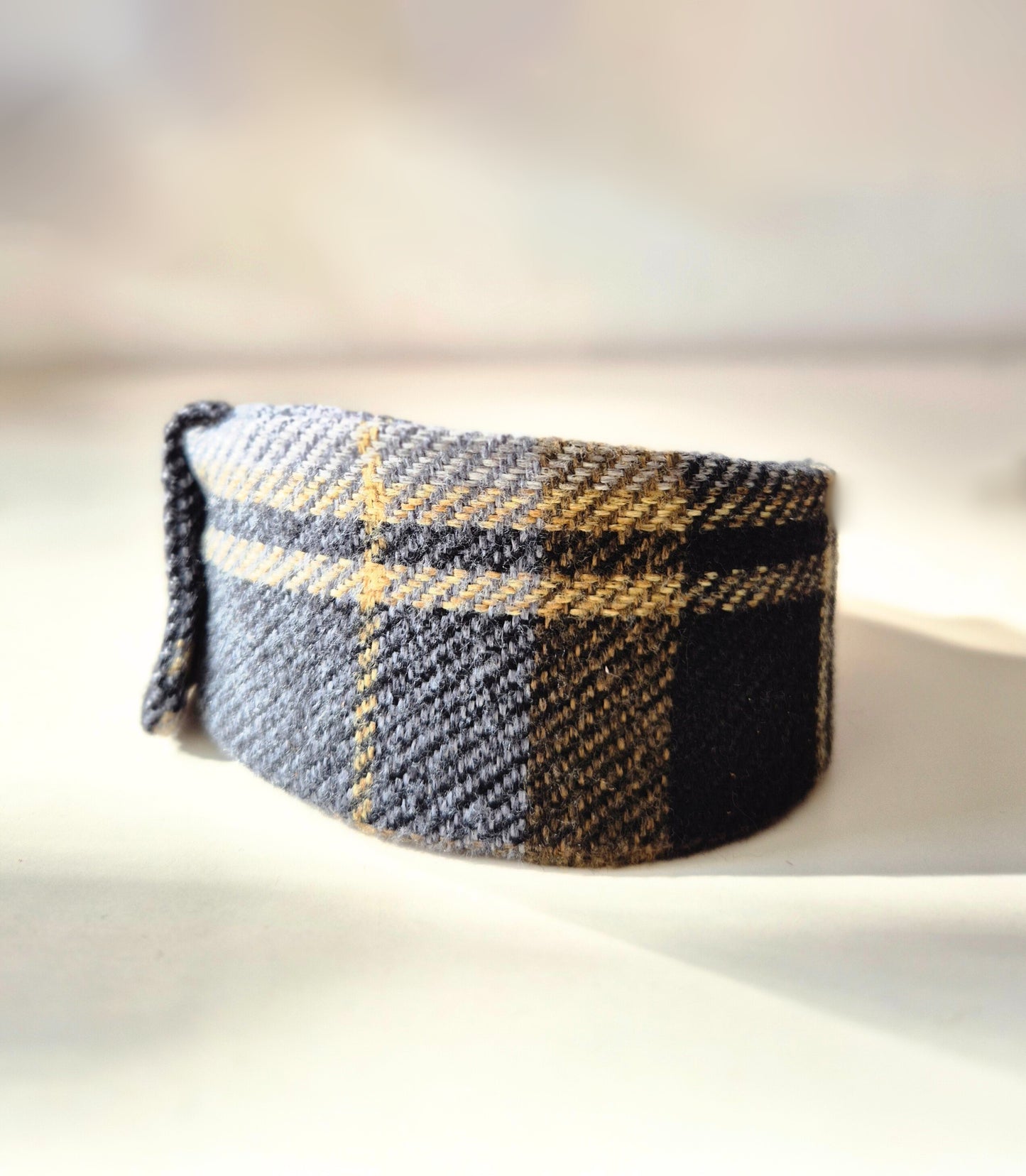Black and gold collar cover