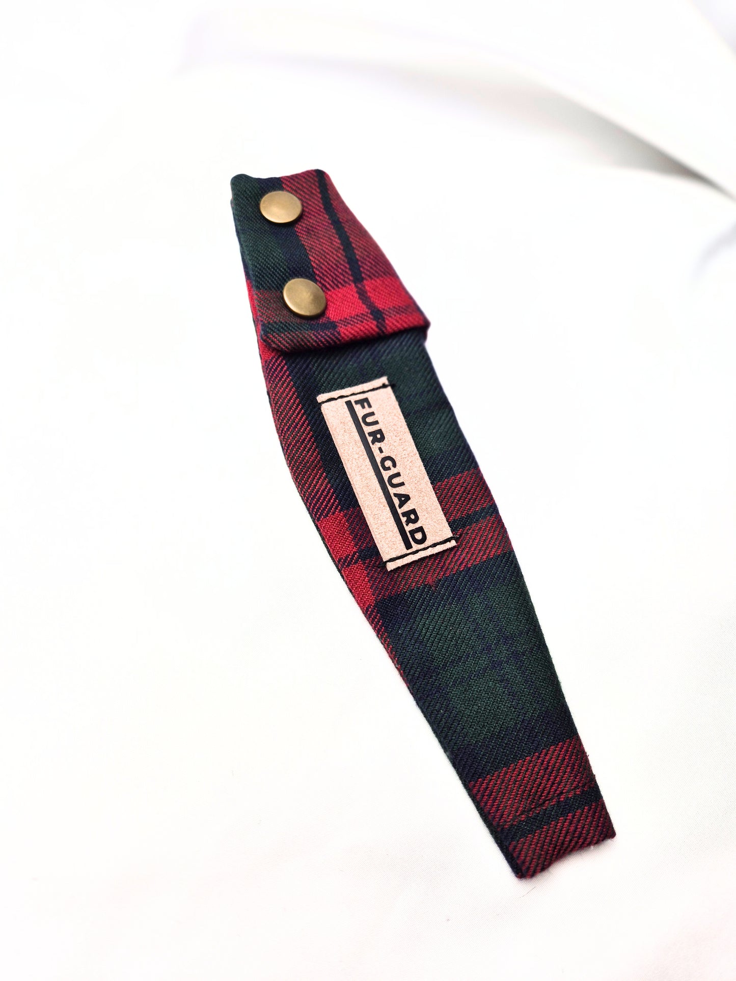 Red and green plaid collar cover